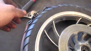 How to bead a tire using ratchet strap [upl. by Yanehc]