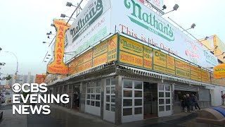 A look at the history of Nathans Famous hot dogs [upl. by Yllac573]