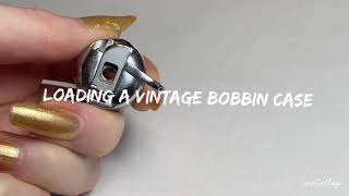 Loading a bobbin case 1950s Necchi BF Mira sewing machine [upl. by Priscella]