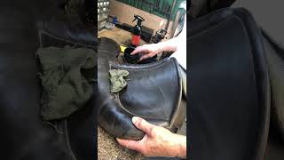 Oiling underneath a saddle by Robert H Steinke Master Saddler amp Harness Maker [upl. by Nnaer]