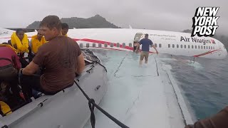 US Navy team performs incredible plane crash rescue [upl. by Nilatak928]