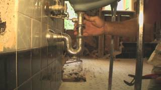 How to Remove an Old Bathroom Sink [upl. by Htrowslle170]