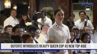 Duterte introduces beauty queen cop as new top aide [upl. by Eneleh879]