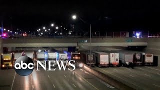 Trucks line up to help stop suicide attempt on Michigan freeway [upl. by Prussian]