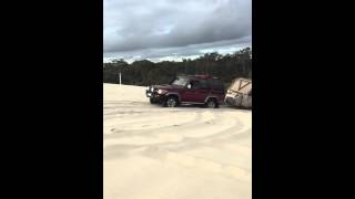 76 series Landcruiser towing Conqueror UEV490 up Yeagarup sand dunes [upl. by Adnalor]