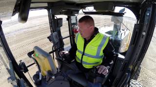 Brandt Positioning Technology  Motor Grader with Topcon Machine Control [upl. by Ellenuahs]