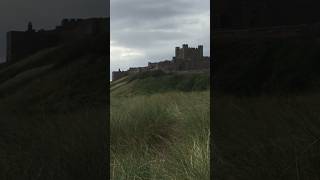 An iconic amp imposing castle that perches above Bamburgh beach on the Northumberland coast path [upl. by Catha]