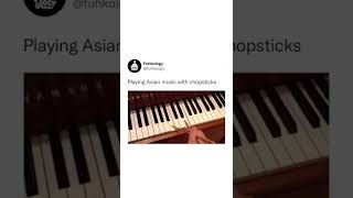 Playing piano with chopsticks 🧧🎶 piano pianomusic pianomusic chopsticks asian music musica [upl. by Jermain]