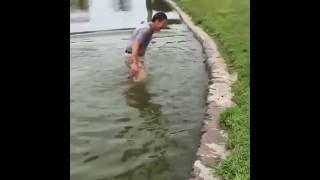 FUNNY GOLF SHOT WHERE MAN FALLS IN WATER [upl. by Butterfield]