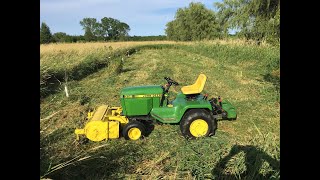 John Deere 332 Garden Tractor Haban Flail Mower Cutting [upl. by Milks]