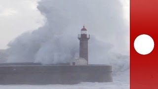 Atlantic storm Huge waves crash into lighthouse in Portugal [upl. by Dillie413]