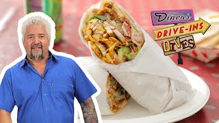 Guy Fieri Eats a Fattoush Chicken Shawarma Wrap  Diners DriveIns and Dives  Food Network [upl. by Letsirk]