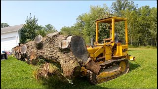 Unearthing a GIANT LOG with a 55 year old Traxcavator 4k [upl. by Sears]