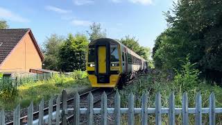 Class 158834 passing Rossett foot Crossing 01082024 [upl. by Hole162]