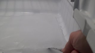 How to Unclog a Refrigerator Drain Line [upl. by Nnahs621]