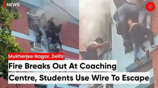 Mukherjee Nagar Fire Fire Breaks Out At Coaching Centre In Delhi Students Use Wire To Escape [upl. by Dolorita21]