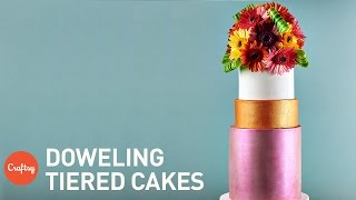 Stacking Doweling a Tiered Cake  Professional Cake Decorating Tips from Kara Andretta [upl. by Neerroc105]