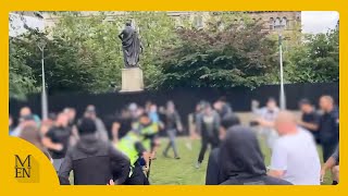 Moment fight breaks out at Enough is Enough protest in Manchester [upl. by Tavis978]