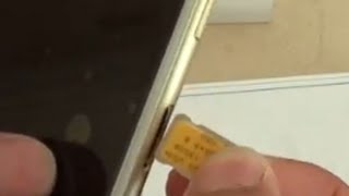 iPhone 6 Plus How to Insert a SIM Card [upl. by Langley]