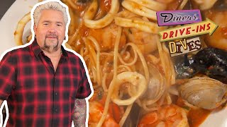 Guy Fieri Eats the quotSeafood Buffet for 90quot in Baltimore  Diners DriveIns and Dives  Food Network [upl. by Pacificas]