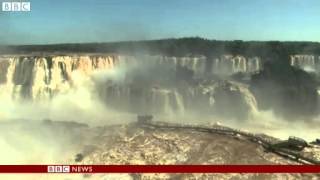 BBC News Iguazu waterfall records biggest ever flow [upl. by Zurkow868]