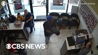 Man tries to rob Atlanta nail salon but gets ignored video shows [upl. by Brenner]