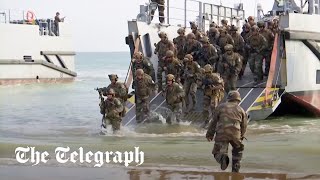 French soldiers hold DDay reenactment as 80th anniversary nears [upl. by Oivalf]