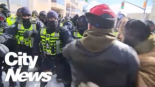 Police clash with protesters in Ottawa [upl. by Popper]