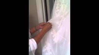 How an over or under bustle works on a bridal ballgown [upl. by Botzow]