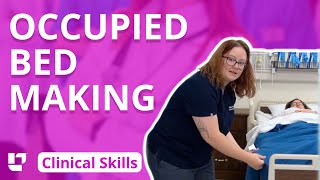 Occupied Bed Making Clinical Nursing Skills  LevelUpRN​ [upl. by Akerdnuhs]