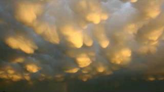 HD timelapse 1080p  freaky mammatus clouds  rainbow 280809 [upl. by Eel]