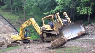 Steep slippery slope for a dozer and excavator [upl. by Enomad54]