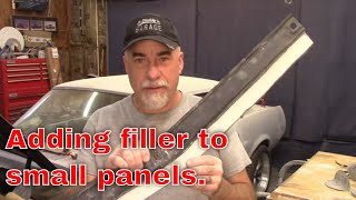 Adding filler to the rock guard on the 68 Mustang Jade part 49 [upl. by Dyl]