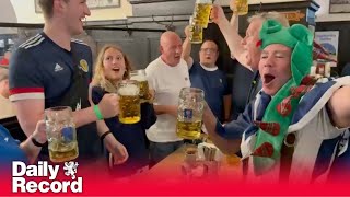 Scotland at Euro 2024 Fans break into rousing rendition of Super John McGinn in iconic Munich pub [upl. by Suilmann]