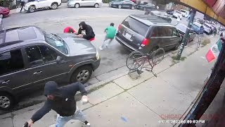 Chicago shootout that injured innocent bystander caught on video [upl. by Bryana123]