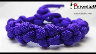 How to make a cross knot paracord bracelet [upl. by Naejeillib514]