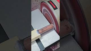 Person is destroying a tube of lip gloss with a sander [upl. by Cutty730]