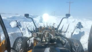 Plowing snow in a road grader [upl. by Durning867]