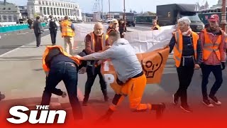 Angry scenes on London Bridge as motorists PUSH Just Stop Oil Protesters blocking traffic [upl. by Bouldon]