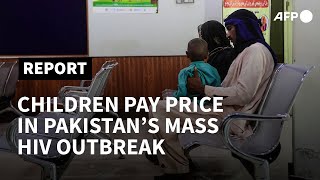 Children pay the price in Pakistans mass HIV outbreak  AFP [upl. by Salena]