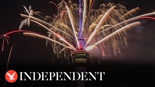 Watch again New Zealand welcomes in 2024 with New Year fireworks over Auckland [upl. by Acinnad206]