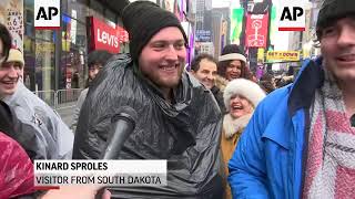 People pack into Times Square for rainy New Years [upl. by Colinson]