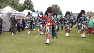 Drum Major Esson leads Ballater Pipe Band playing on the march into 2023 Aboyne Highland Games [upl. by Arehsat]