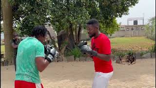 Bobi Wine taking tips from the World Boxing Champion Kassim Ouma [upl. by Depoliti]