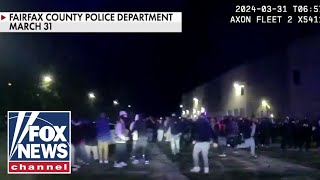 Crowds swarm Virginia police officers in street takeover [upl. by Haggar748]