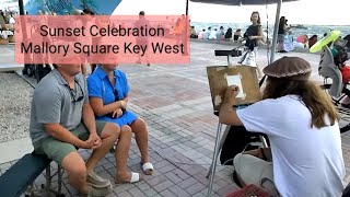 Sean Dwyer working Key West artist paints portraits at Mallory Square Sunset Celebration in KeyWe [upl. by Yendys]