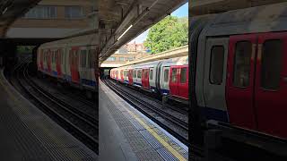 A District Line train arriving at Ealing Common with a service to Upminster train [upl. by Nannerb]