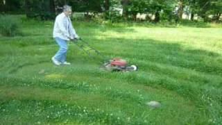 mowing a grass chartres labyrinth at Waycross [upl. by Domingo346]