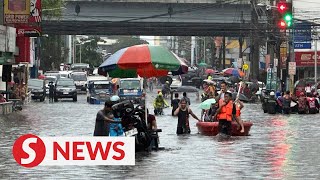 Heavy rains from Typhoon Gaemi render Manila streets underwater [upl. by Nadroj]