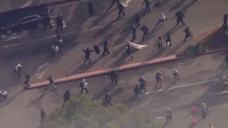 ProPalestine protesters clash with LAPD at LAX [upl. by Fe]